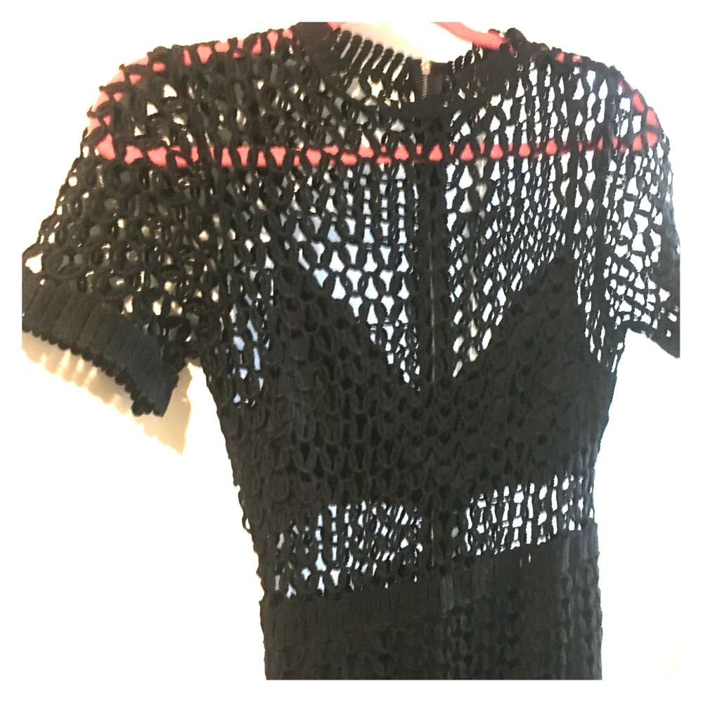 Black crochet dress with kick pleat